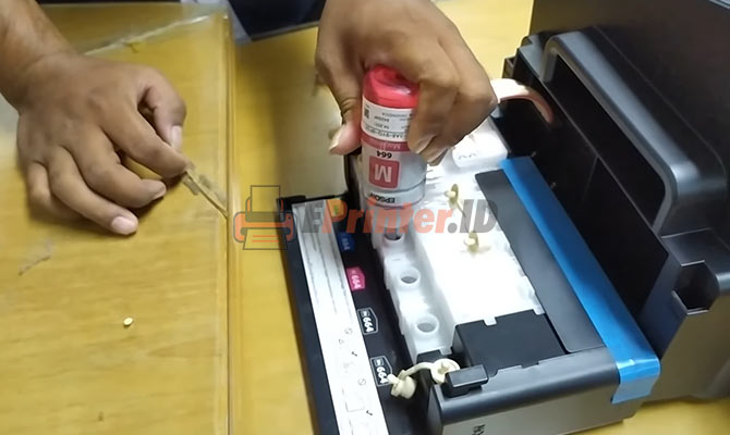 Mengisi Tinta Printer